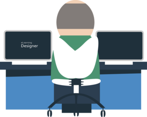Elearning designer at computer rear 4707